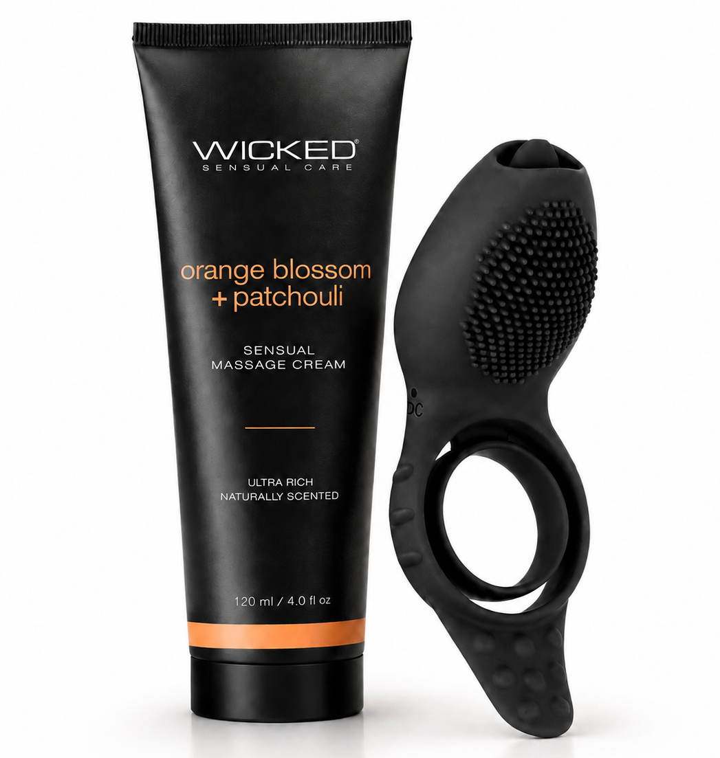 Wicked Sensual Care orange blossom + patchouli sensual massage cream in a black squeeze tube next to a black silicone massager with a textured head and finger ring, on a white background.