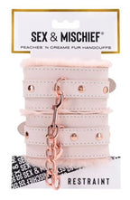 Peaches N Creame Fur Handcuffs by Sportsheets from LoveMart Co.
