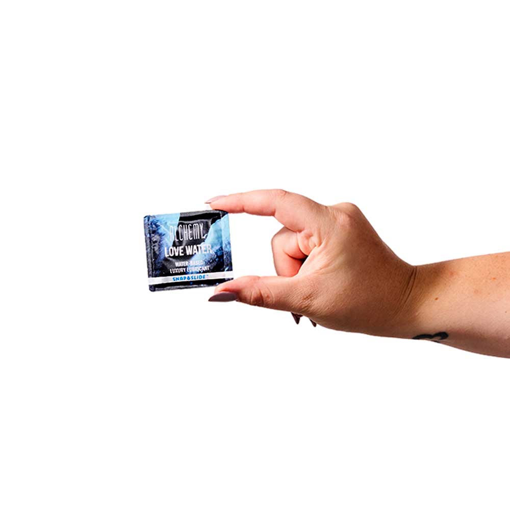 Alchemy Love Water Snap Slide Disp 12 pks 16ct -Water-Based Lube by Alchemy from LoveMart Co.